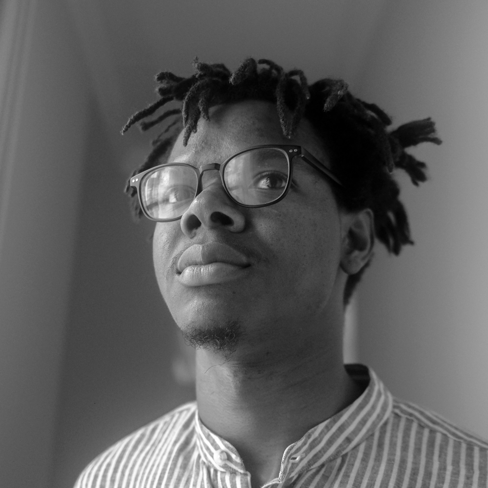 Portrait of filmmaker and curator Tobi Akinde